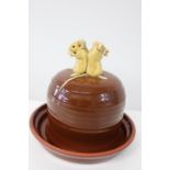 A vintage art pottery cheese bell & dish