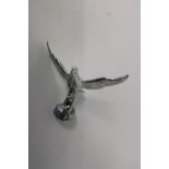 A vintage bird form car mascot 14x10cm