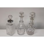 Three cut glass decanters (sold as seen)