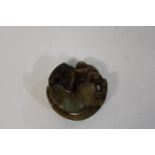 A Jade amulet of a monkey on a horse d5cm