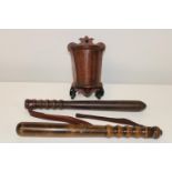 Two antique wooden truncheons & wooden wall pocket
