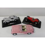 Three assorted collectable car models
