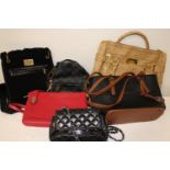 A selection of Ladies hand bags & purses (sold as seen)