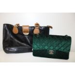 Two Ladies hand bags one leather (sold as seen)