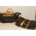 Two travel bags (sold as seen)