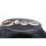 Four assorted 9ct gold rings