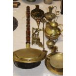 A good selection of assorted vintage brass ware