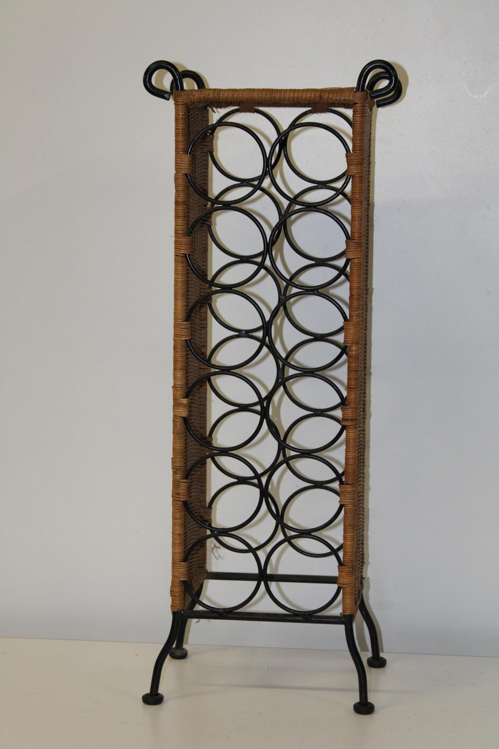 A metal & wicker work wine rack Collection only