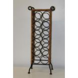 A metal & wicker work wine rack Collection only