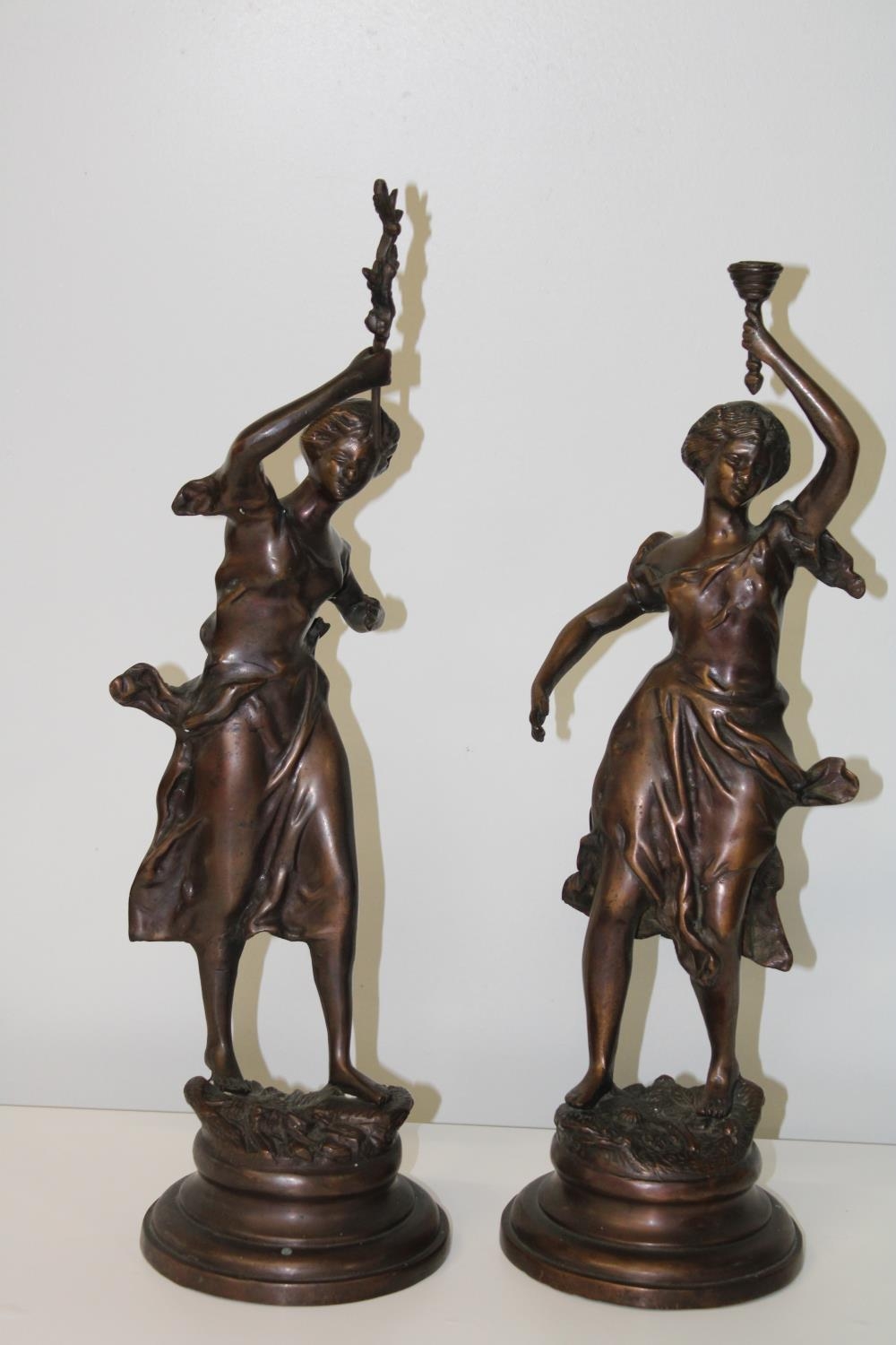 A pair of early 20th Century bronzes signed Rousseau h54cm