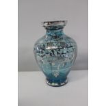 A vintage hand decorated pale blue vase h20cm