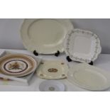 A box of assorted collectors plates & other