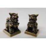 A small pair of Chinese bronzed temple dogs