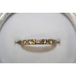 A 9ct gold 1/2 eternity set with white stones size N 1/4