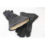A pair of vintage leather motorbike gloves
