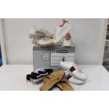 A job lot of assorted training shoes etc (sold as seen)