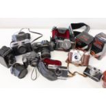 A job lot of assorted cameras & lenses etc