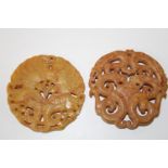 Two carved jade amulets