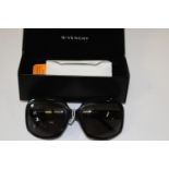 Givenchy Black rectangular sunglasses & case. The inscription on the arms read GIVENCHY SGV 597S COL