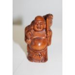 A carved boxwood netsuke