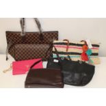 A job lot of assorted handbags (sold as seen)