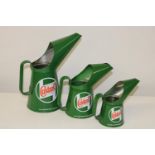A set of three graduated reproduction Castrol oil cans