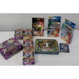 A selection of Pokemon and Yu-Gi-Ho cards (sold as seen)