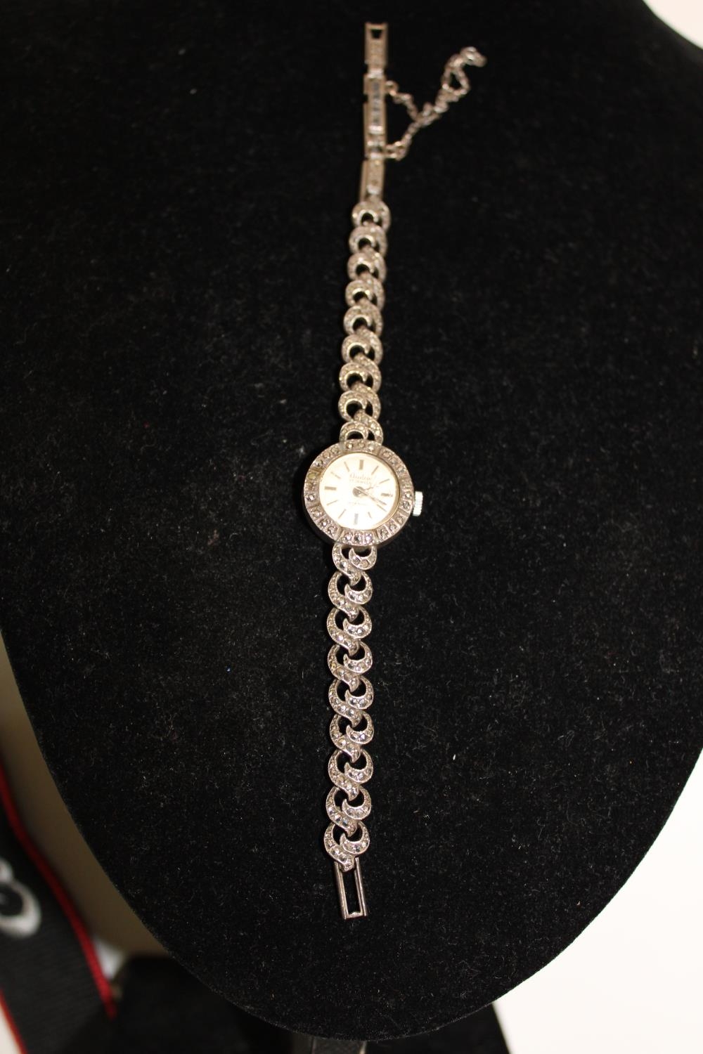 A hallmarked silver & marcasite Ladies cocktail watch, working when tested. ( crack to the glass