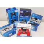 A box full of wireless game controllers (sold as seen)