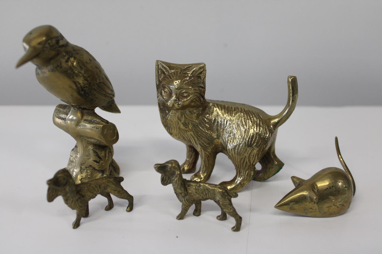 A selection of novelty brass figures