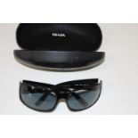 Prada Black & Chrome sunglasses with case.