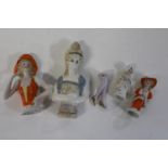 A selection of vintage half doll figures