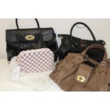 A job lot of assorted handbags (sold as seen)