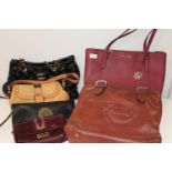 A job lot of assorted handbags (sold as seen)