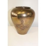 A Japanese bronze vase with bird detail signed to the base (sold as seen) 21 cm