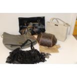 A job lot of assorted handbags (sold as seen)