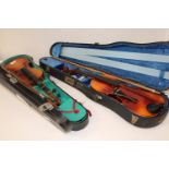 Two cased violins (sold as seen)