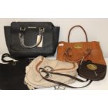 A job lot of assorted handbags (sold as seen)