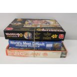 Three boxed jigsaw puzzles