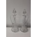 A pair of quality cut glass decanters h42cm