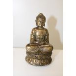 A bronze Buddha with marks to the base h12cm