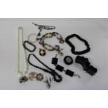 A job lot of costume jewellery including possible jet