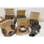 A box full of WW2 period gas masks (sold as seen)