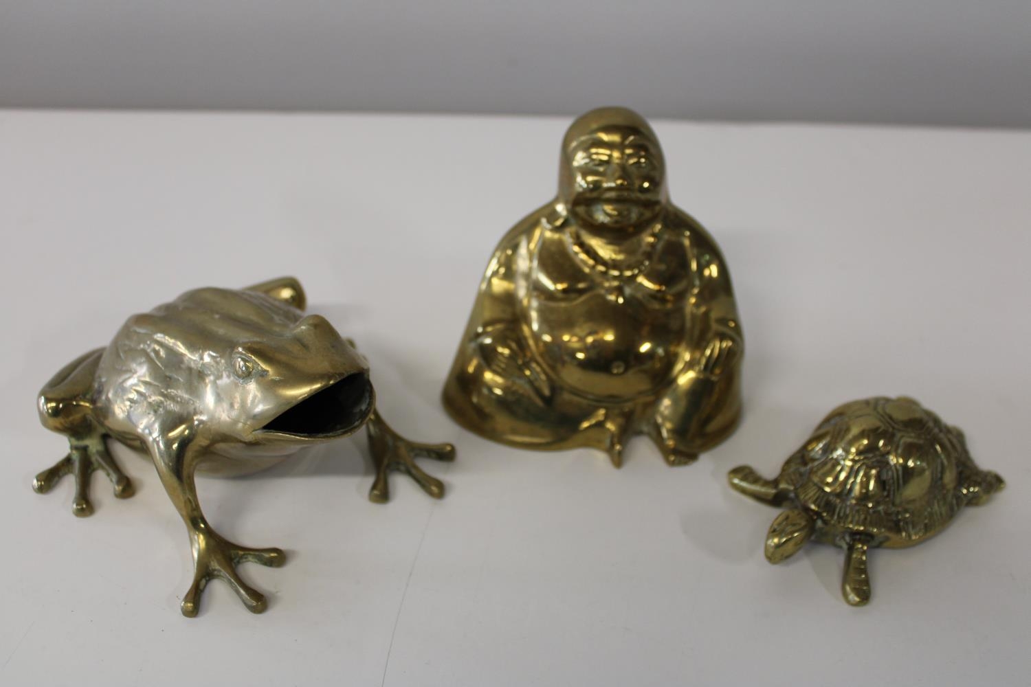 Three pieces of novelty brass ware