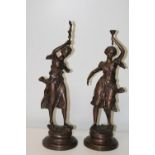 A pair of early 20th Century bronzes signed Rousseau h54cm