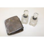 Two silver collared perfume bottles & a silver cigarette case (sold as seen)