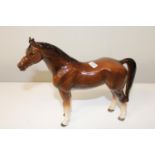 A porcelain horse figure