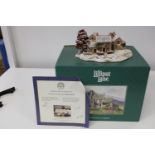 A large boxed limited edition Lilliput Lane model 'The first snow at bluebell'