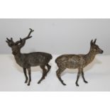 An Austrian cold painted stag & deer (damage to the antlers on the stag) sold as seen h10cm