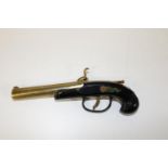 A novelty vintage lighter in the form of a flintlock pistol